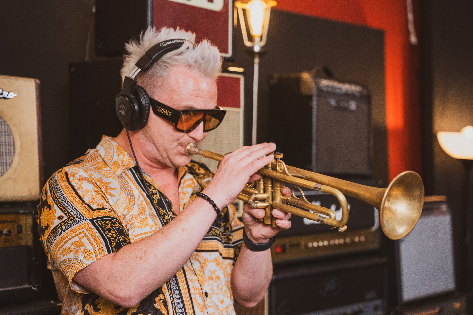 Trumpet player recording at Atmosphere Agency studio sessions in Belfast, Northern Ireland